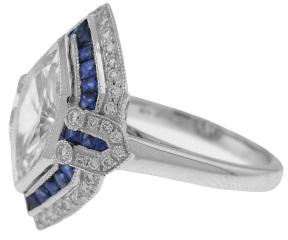 SOLD: Platinum marquise diamond and sapphire ring.