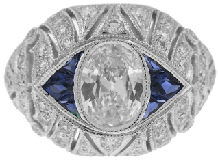 Platinum antique style oval diamond and sapphire ring