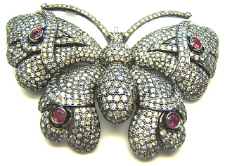 18kt white gold ruby and diamond butterfly pin