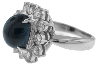Platinum cabochon sapphire and diamond ring