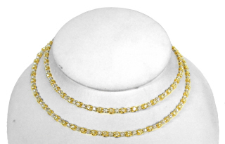 18kt two-tone 32" 4-prong diamond necklace.