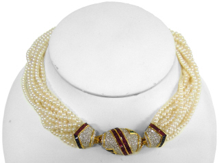 12-strand pearl necklace with 18kt yellow gold ruby, sapphire, emerald and diamond clasp.