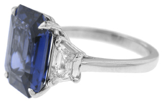 Platinum emerald cut sapphire and trapezoid diamond ring