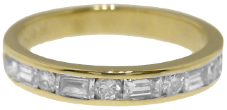 14kt yellow gold round and baguette diamond channel set half around band
