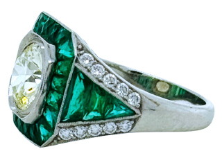 Platinum ring with transition cut diamond 1.43cts M-N SI1, emeralds and diamonds