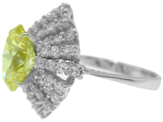 18kt white gold ring with irradiated yellow oval diamond 2.54 carats