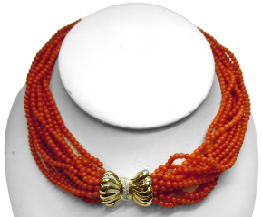 13-strand coral bead necklace with 14kt yellow gold clasp.