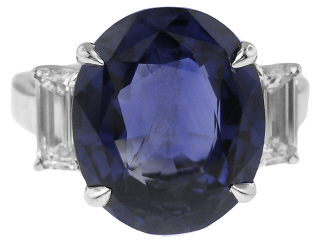 Platinum oval sapphire and emerald cut diamond ring