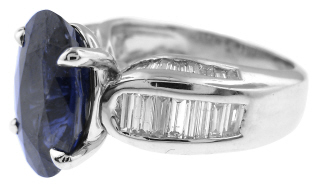 Platinum oval sapphire and baguette diamond ring