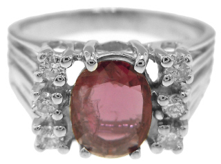 14kt white gold oval ruby and diamond ring