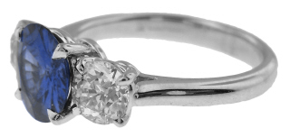 Platinum sapphire and diamond three stone ring