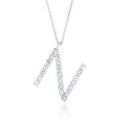14kt white gold diamond "N" pendant with chain.