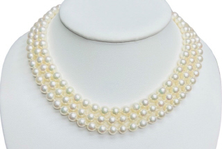 Three row 6.5mm pearl necklace with 14kt white gold diamond clasp
