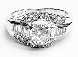 18kt white gold diamond bypass engagement ring.