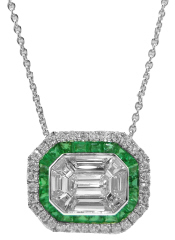 18kt white gold emerald and diamond illusion style halo pendant with chain.