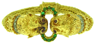 18kt yellow gold diamond, emerald, and ruby bracelet signed Lalalounis
