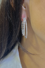 18kt white gold double row diamond hoop earrings.