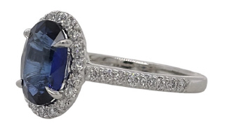 Platinum oval sapphire diamond halo ring