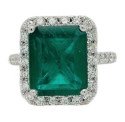 18kt white gold Emerald and diamond halo ring