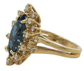 14kt yellow gold blue topaz and diamond ring.
