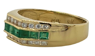 14kt yellow gold 3-row channel set emerald and diamond ring.