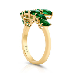 18kt yellow gold mixed shape emerald bypass ring.