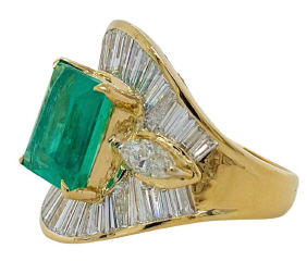 18kt yellow gold emerald and diamond ring.