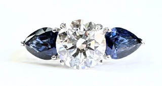 Lab Grown: 18kt white gold Lab Grown Diamond and Natural Sapphire ring.