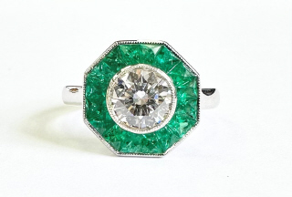 Lab Grown: 18kt white gold Lab Grown Diamond and Natural Emerald ring.
