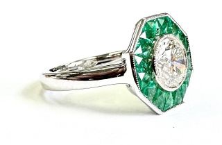 Lab Grown: 18kt white gold Lab Grown Diamond and Natural Emerald ring.