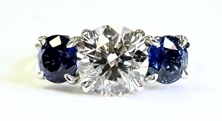 Lab Grown: 18kt white gold Lab Grown Diamond and Natural Sapphire ring.