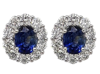 14kt white gold sapphire and diamond halo style earrings.