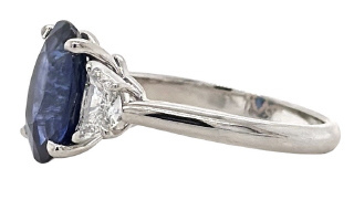 18kt white gold sapphire and diamond 3-stone ring.