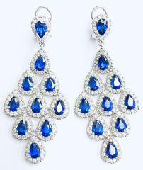 18kt white gold sapphire and diamond dangle earrings.