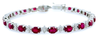 18kt white gold oval ruby and diamond star element bracelet