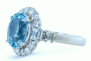 18kt white gold oval aquamarine and diamond ring.
