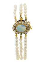 14kt yellow gold opal and diamond clasp with 3 strand of pearls.