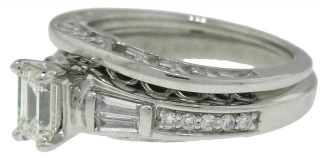 14kt white gold emerald cut solitaire .54ct K-L SI1 with matching band