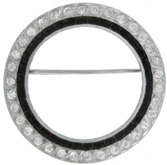Platinum calibre cut black onyx and diamond circle pin