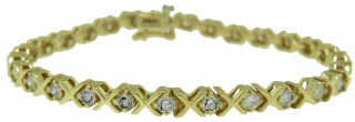 14kt yellow gold "X" design diamond bracelet 6 3/4"
