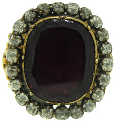 18kt yellow gold and silver antique mine cut diamond and garnet ring