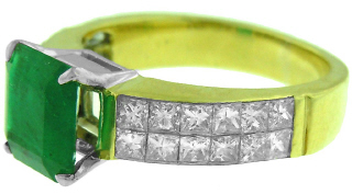 Platinum and 18kt yellow gold emerald and princess cut diamond ring